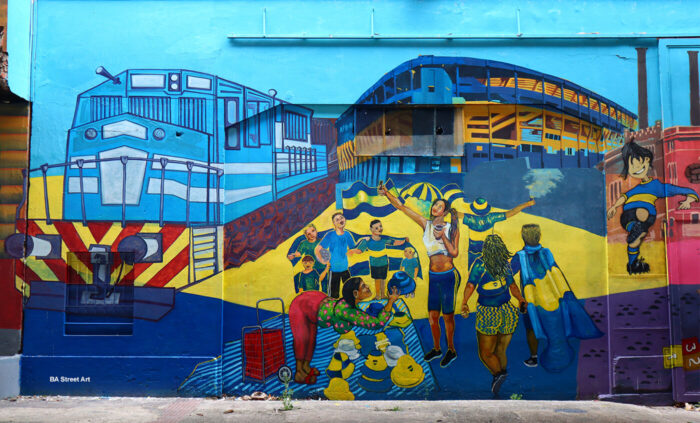 La Boca street art project with artists painting murals relating to ...